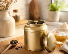 Afbeelding in Gallery-weergave laden, Goudkleurige bewaarblik voor thee - ca. 150 gram -